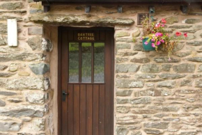 Oak Tree Cottage nestled in the hills of the Lake District and Yorkshire Dales